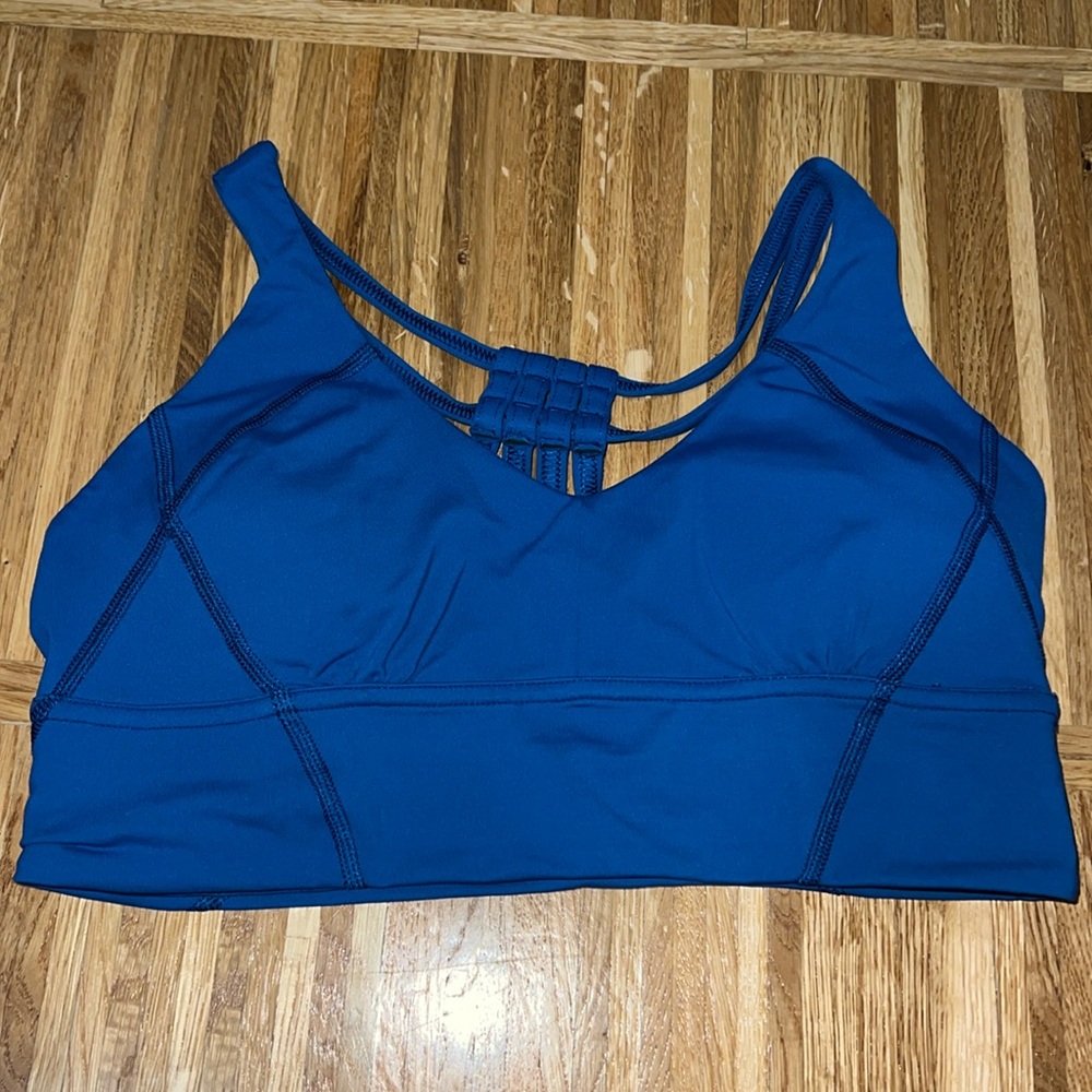 NEW without tags never worn size 6 blue sports bra with strappy back